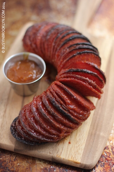 The slicer cuts the whole salami into pieces in a matter of seconds.