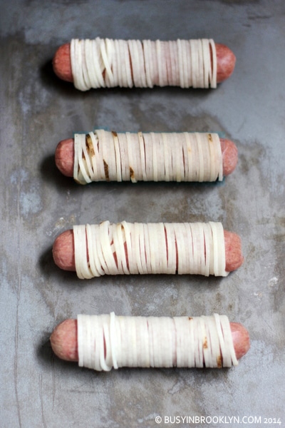 https://busyinbrooklyn.com/wp-content/uploads/2014/08/potato-wrapped-hot-dogs.jpg