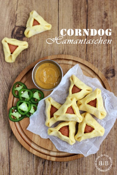 https://busyinbrooklyn.com/wp-content/uploads/2016/02/corn-dog-hamantaschen.jpg