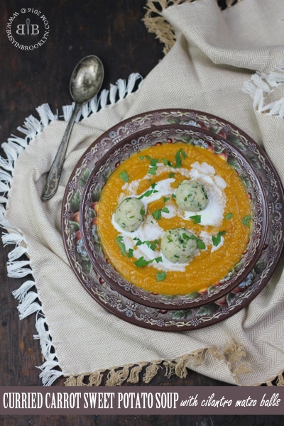 Curried Carrot & Sweet Potato Soup <br>with Cilantro Matzo Balls